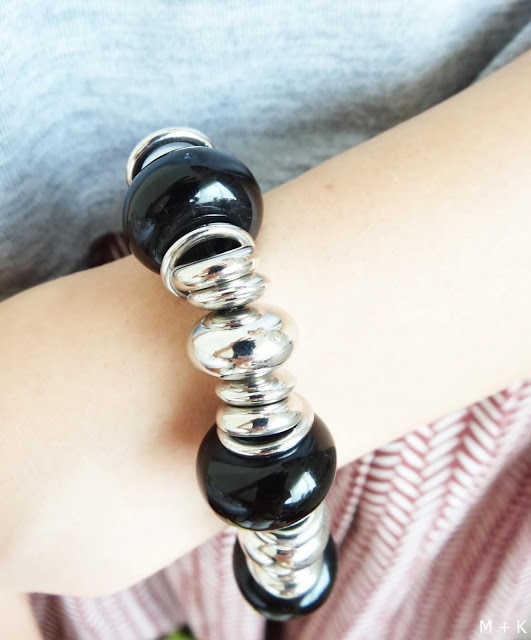 http://www.ringsandtings.com/collections/bracelets/products/black-and-silver-beads-bracelet