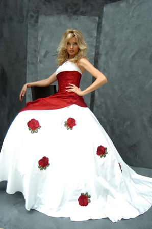 Roses which decorate the white wedding dress symbolizes virginity for the