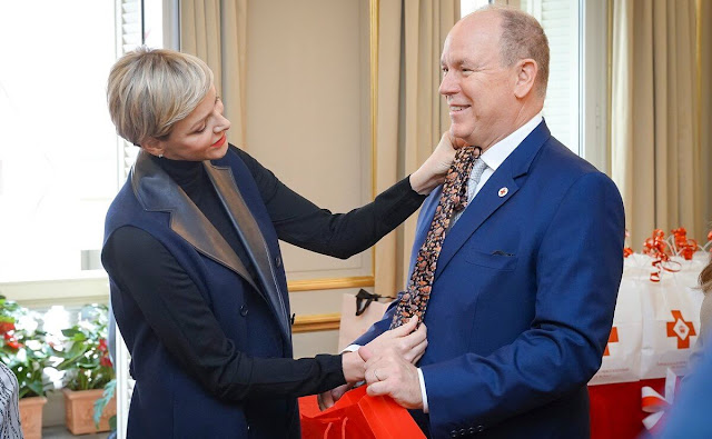 Princess Charlene wore a leather collar shearling navy wool sleeveless long vest gilet. Camille Gottlieb
