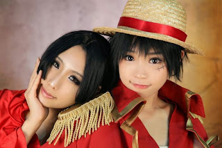 Luffy and Boa Hancock cosplay by Tomia and Tasha