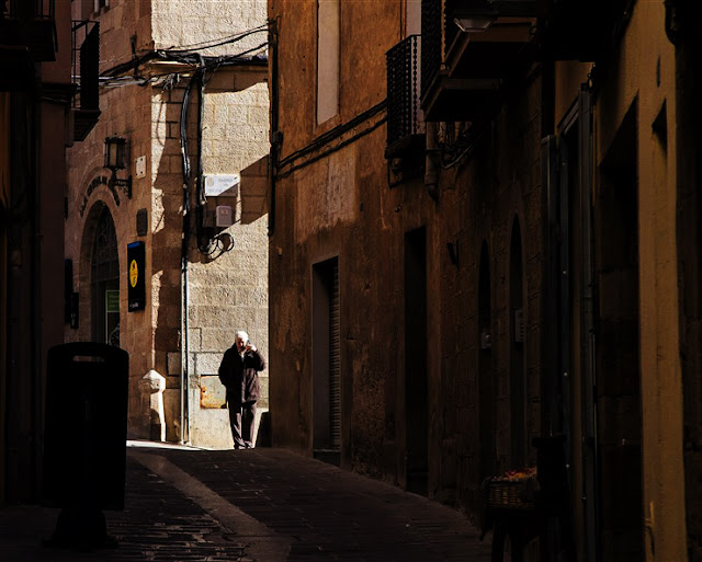 old man mobile phone cardona spain streets europe