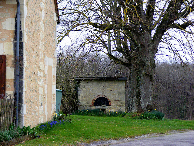 Restored bread oven in a garden, Indre et Loire, France. Photo by Loire Valley Time Travel.