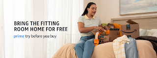 Amazon Try before you buy - black woman sitting on her bed looking at clothes