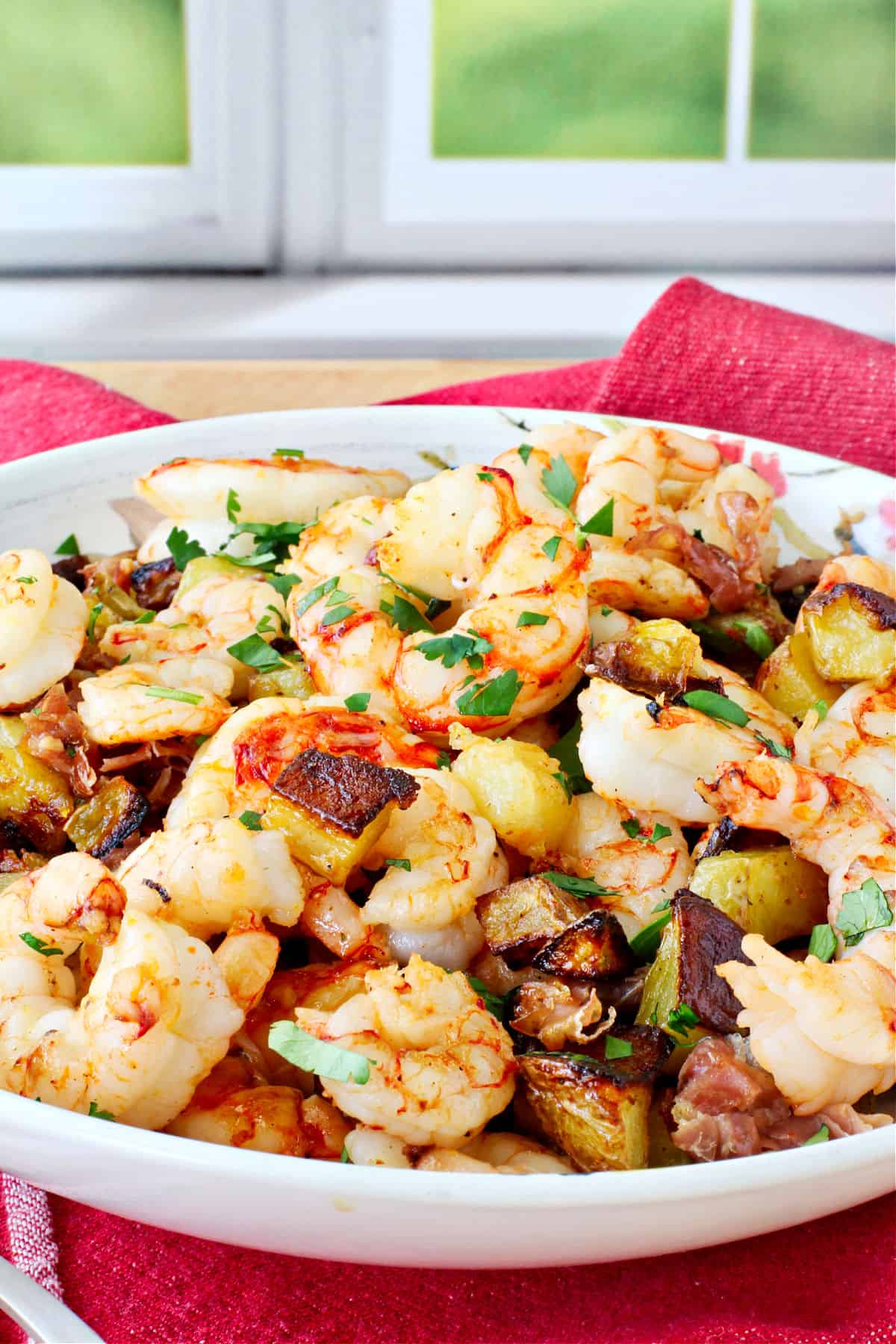 Sheet Pan Shrimp, Roasted Potatoes, & Prosciutto in a bowl.