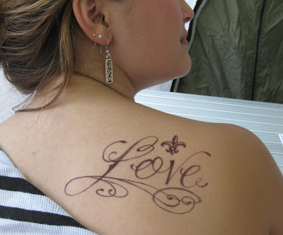 Love script with a fleur de lis her favorite symbol