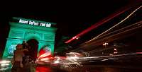 The Arc de Triomphe is illuminated in green with the words ''Paris Agreement is Done'', to celebrate the Paris U.N. COP21 Climate Change agreement in Paris, France, November 4, 2016. (Credit: Reuters/Jacky Naegelen) Click to Enlarge.