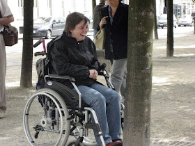 wheelchair facing a tree