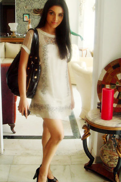 asin in white skirt   