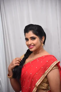 Telugu Anchor Shyamala in Pink and Red Half Saree Stills