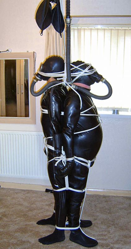 2 rubber slave Seen like these 2 slave have some fun with them Master be 