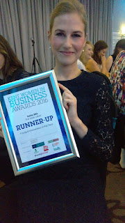 Founder Katie with award