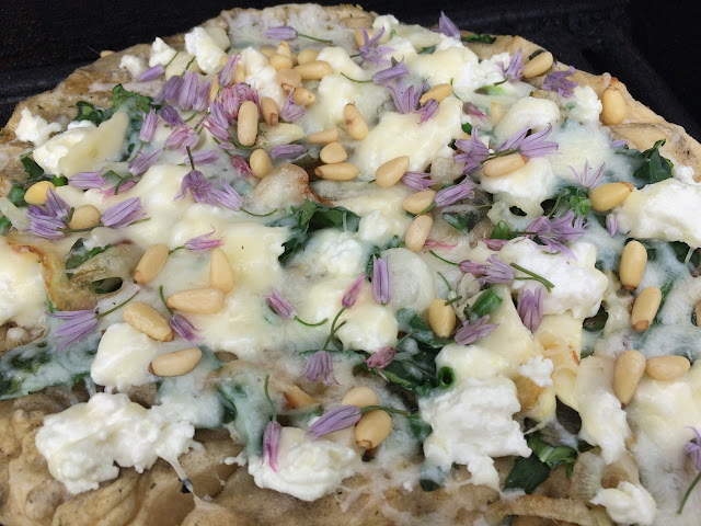 grilled pizza goat cheese pine nuts chive flowers