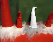 First, determine what size triangle you need to cut for your Tomte.