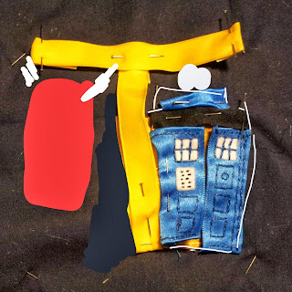 Photo of T for Tardis with the towel and rail drawn on as a colour test and the outline of the Tardis as white as a test