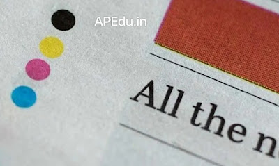 Why are there four colored dots at the end of the newspaper?  Description