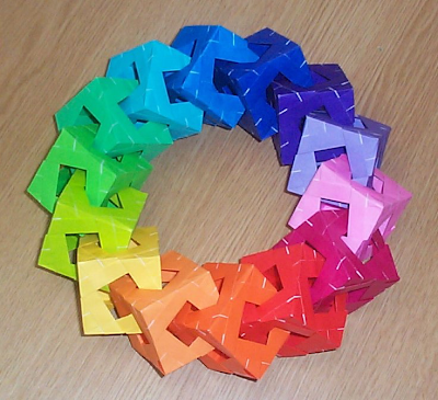 Fourteen cubes in a ring, from MODULAR ORIGAMI POLYHEDRA by Simon, Arnstein and Gurkewitz