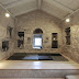 Minimalist decor in a big stone house