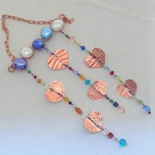 Free tutorials to make a garden wind chime and sun catchers using beads, glass gems and embossed foil hearts: Lisa Yang's Jewelry Blog