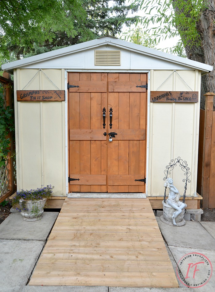 How to get the look of a wood-burned sign with paint! A fun DIY salvaged junk wood "faux wood-burned" Garden Shed Sign that matches the real thing!