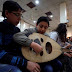 أطفال سوريا يعزفون لحن السلام والحياة وسط الدمار في حلب