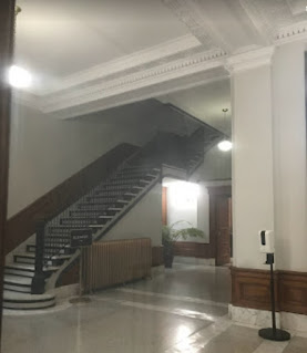 This photo features the white marble inside the County Office Training Building - John mentioned a history of ghost activity near the staircase © Photo by HW