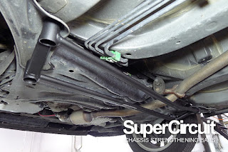 SUPERCIRCUIT Front Lower Brace installed to the chassis of the 2018 Perodua Myvi Gen3.