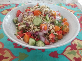 delicious summer vegetables mixed into a sprouted lentil salad