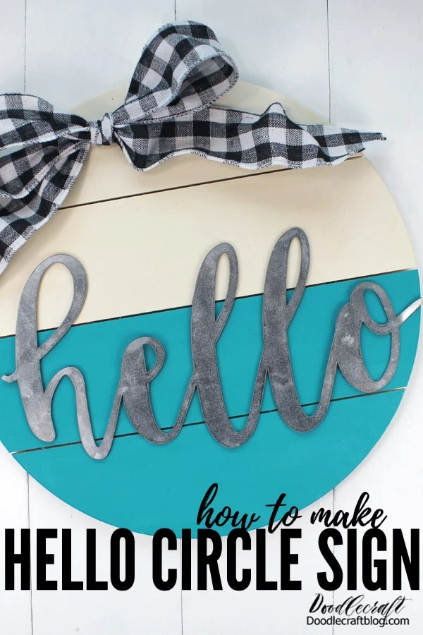 How to Make a Circle Wood Sign!   Make the perfect wood circle hello sign. These circle signs are all the rage and they are a perfect alternative to a wreath or door hanging.     Make a darling hello sign with a wooden circle pallet, some paint, ribbon and a galvanized hello!