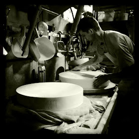 Gruyere cheese being made © 2013 Denis Balibouse