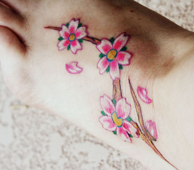 sunflower tattoos on foot. tattoo designs for feet.