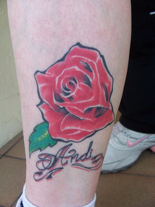 flower tattoo pictures. Rose flower tattoo on foot