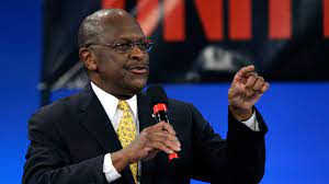 Herman Cain remains hospitalized 1 month after COVID-19 diagnosis