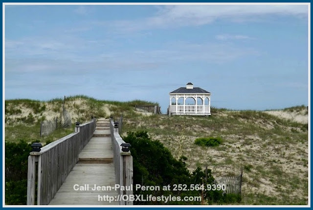 Enjoy the view from the dune top gazebo and plan a weekend swim with family and friends in this canal front home for sale in Corolla NC.