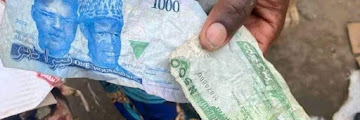 See What Nigerians Did To The New Naira Notes That Stirs Reactions 