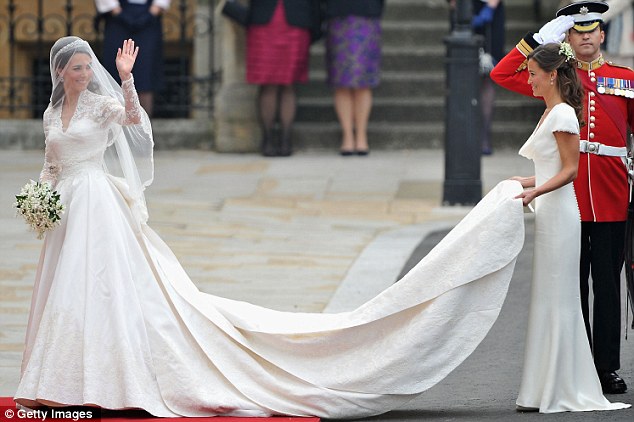 pippa middleton thigh. Maid of Honour: Pippa Middleton carries the train of her sister#39;s dress at