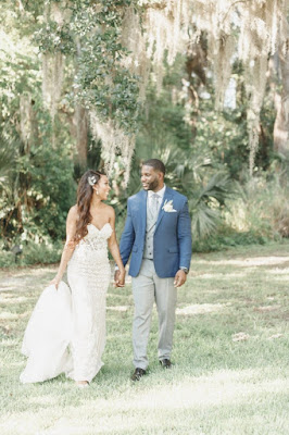 bride and groom walking at lake mary events center