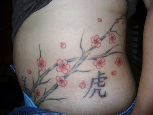 japanese cherry blossom tattoo. cherry blossom tattoo meaning.