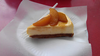 Amaretto cheesecake topped with caramelised peaches