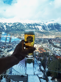 Drinking a beer at Bergisel Olympic ski jump in Innsbruck Austria