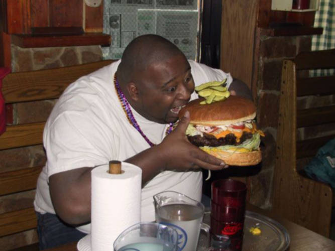 picture of fat kid eating cake. Not correct "portion size"