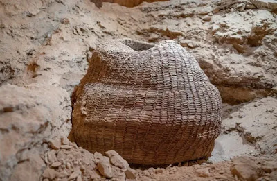 The 10,500-year-old basket as found in Muraba‘at Cave. (photo credit: YANIV BERMAN/IAA)