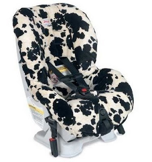 Chase's Britax Cowmooflage car seat, probably jacked up by 20%