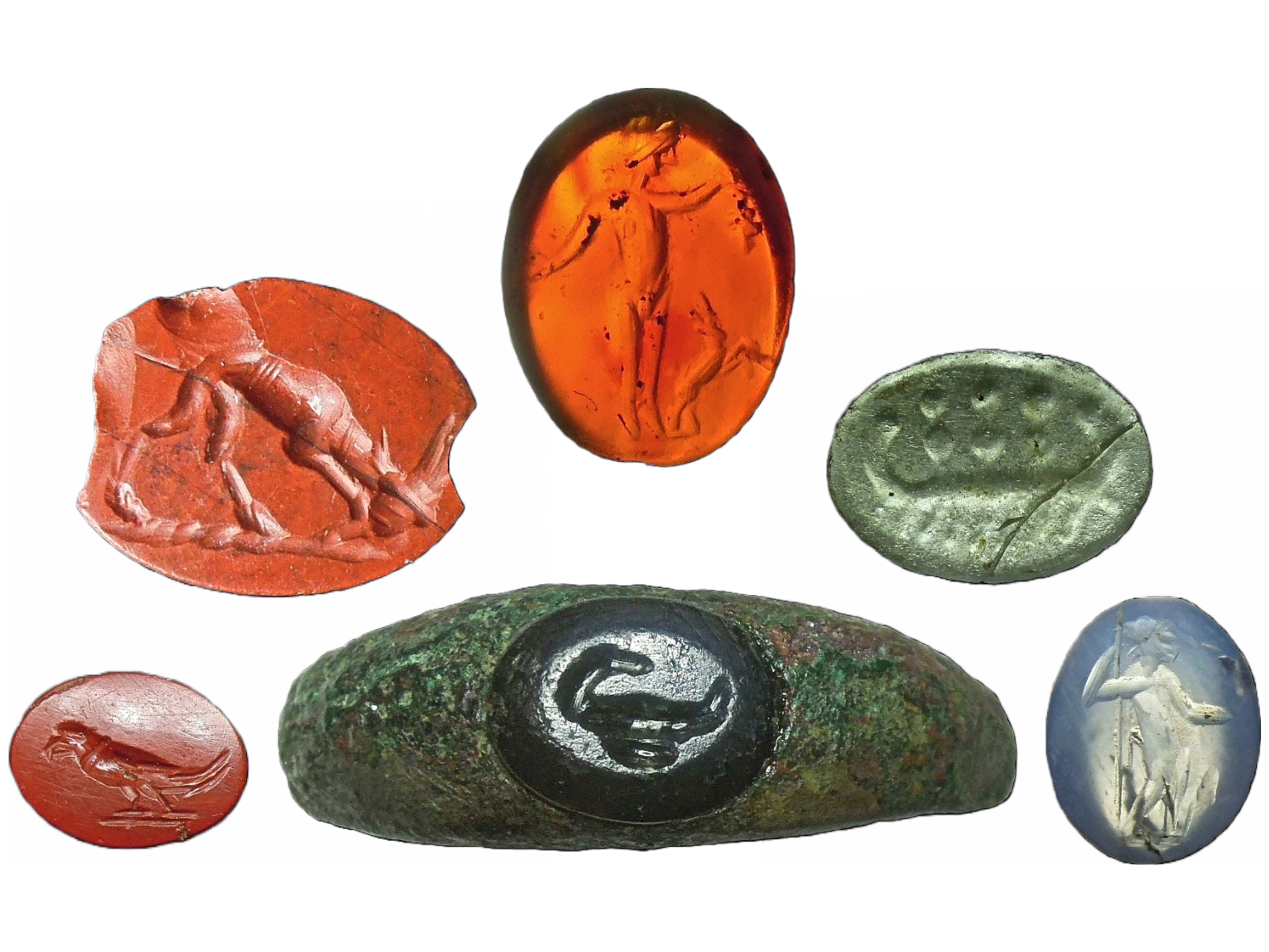 Six assorted Roman gemstones featuring designs of animals and deities