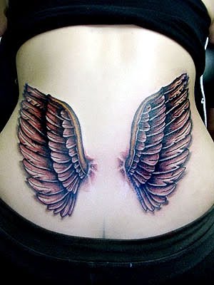 intim tattoo. Small wings tattoo design on