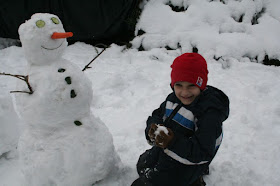 Happy son during winter storm