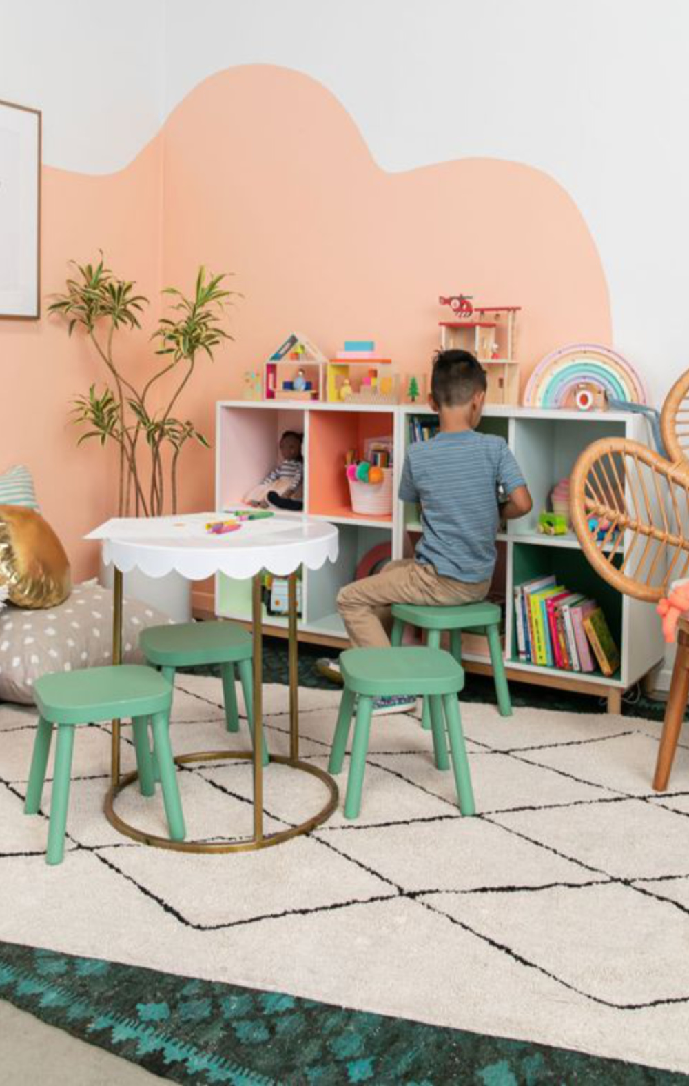 peach playroom with pops of green and colour