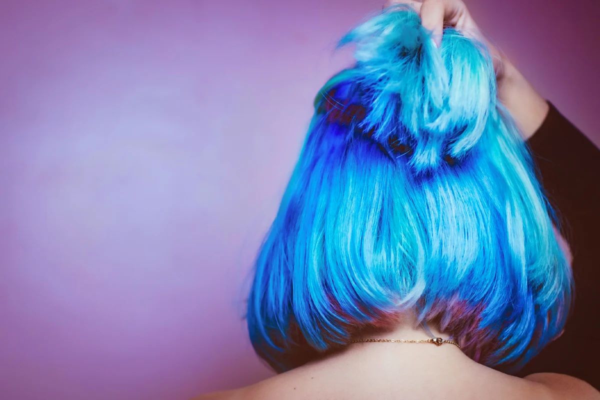 woman with a bright blue hair wig