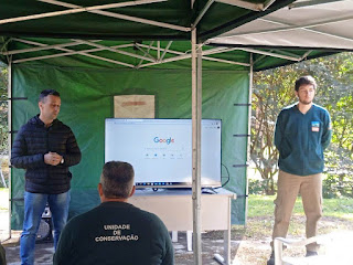 Subsecretário de meio ambiente, Sebastião Neves Tavares Jr., e o gestor do Parque Municipal, Vitor Cunha, no II Encontro de Pesquisas promovido pela unidade