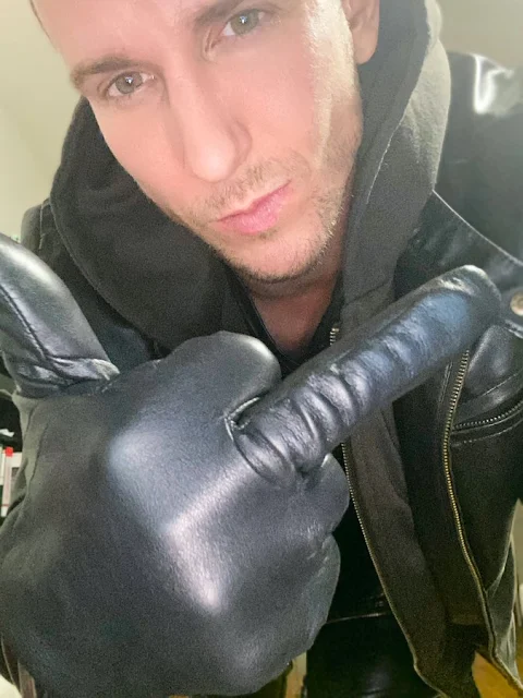 Wearing leather gloves and jacket Absoluteperfection gives the middle finger