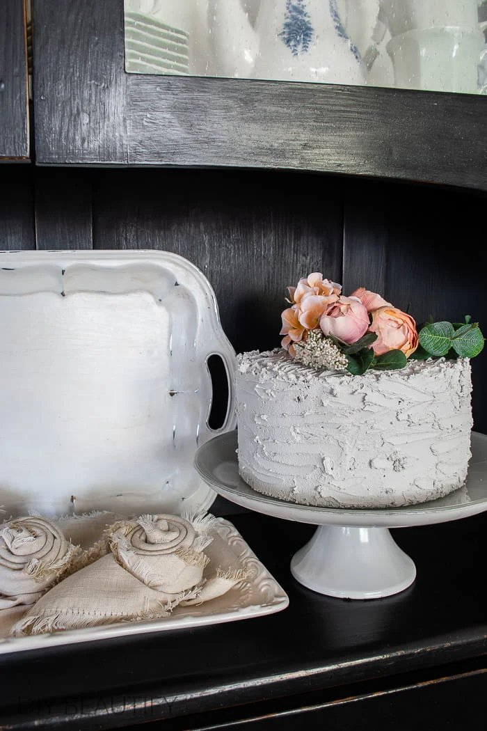 fake cake with pink peonies